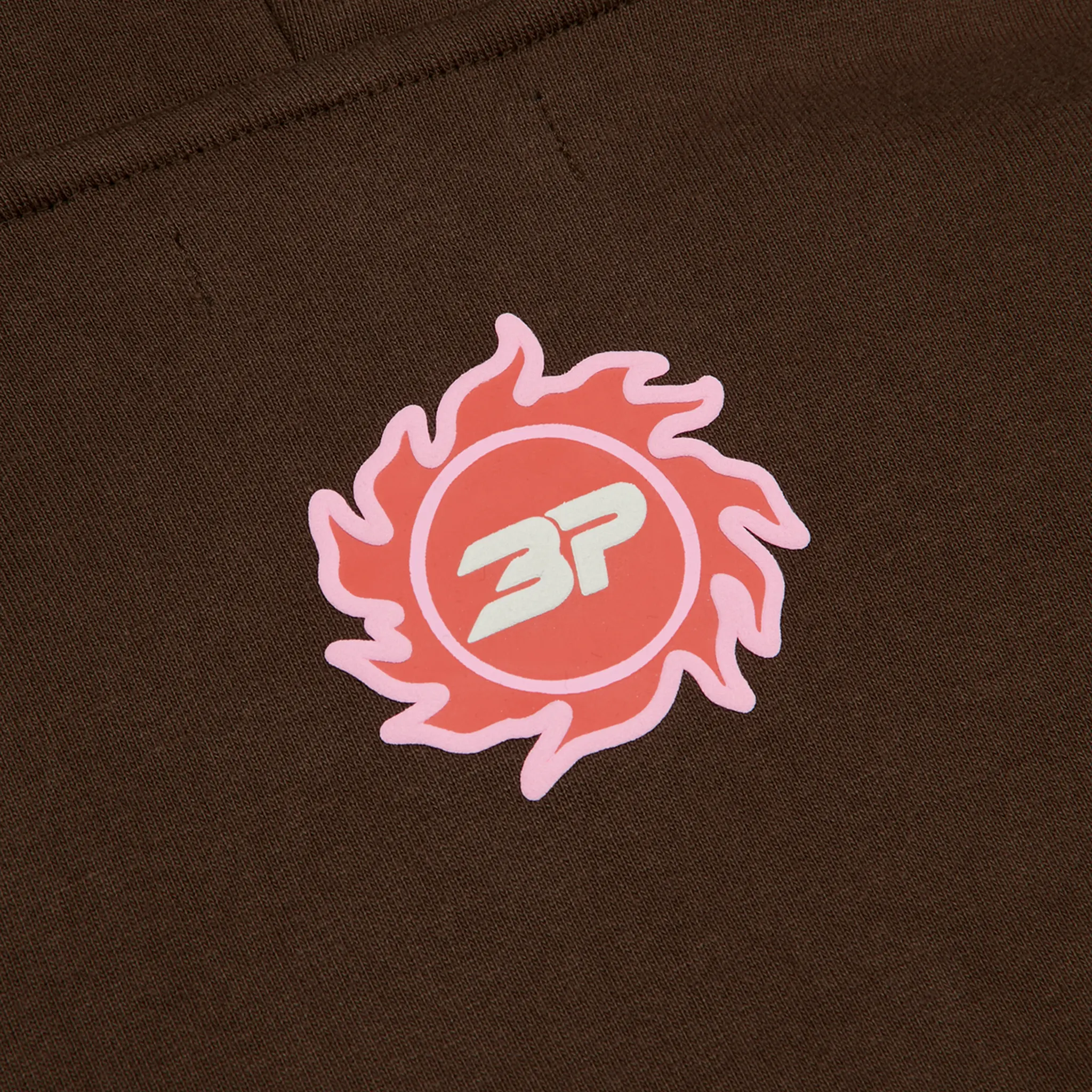 Logo view of Broken Planet It Starts With Luv Mocha Brown Hoodie